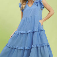 Light blue tiered midi dress with ruffle sleeves, textured fabric