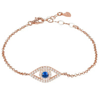 Rose-gold evil eye elliptical charm bracelet with blue center stone