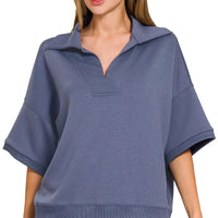 Blue indigo scuba collared short-sleeve pullover with V neckline placket, relaxed fit