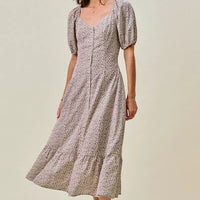 Ditsy floral midi dress full-body view, elastic waist, puff sleeves, self belt tie