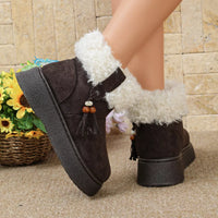 Faux fur lined ankle boots, round toe, black suede with white fuzzy cuffs and tassel charm