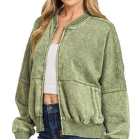 Olive acid-washed fleece zip jacket with kangaroo pocket, ribbed cuffs, and hem
