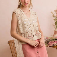 Natural crochet sleeveless vest top with V-neck and granny-square starburst pattern