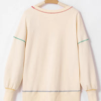 Ivory long-sleeve sweatshirt, back view, with contrast stitched hem and cuffs