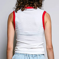 Back view of off-white ribbed sleeveless tank with red contrast trim around neck
