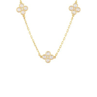 Gold triple choker necklace with clover flower charms and crystal centers