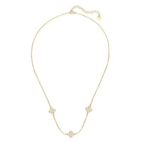 Gold triple choker necklace with clover flower charms on adjustable chain