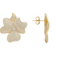 Gold flower stud earrings with visible post and backing clasp