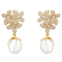 Gold floral earrings with white pearl drop, jeweled petal design