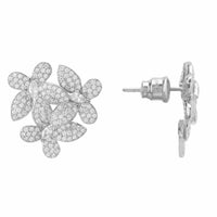 Silver flower stud earrings with butterfly backs, side view