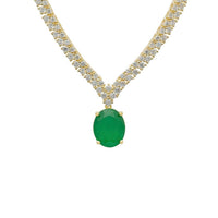 Gold tennis necklace with oval emerald drop and clear pave stones