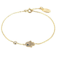 Gold-tone hamsa hand charm bracelet with blue center stone and chain links