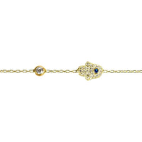 Gold-tone hamsa hand bracelet with pave-style hamsa and blue center charm