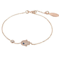 Rose gold hamsa hand charm bracelet with blue center stone and oval links
