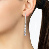 Silver crystal drop earrings with a long dangling chain