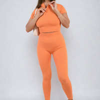 Orange ribbed half-zip crop top and high-waist leggings co-ord set
