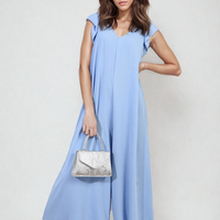 Sky blue wide-leg jumpsuit with V-neck and ruffle sleeves, full-length front view