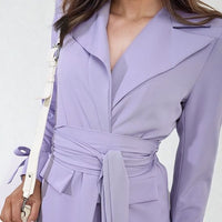 Lilac belted blazer jacket with V-neck, long sleeves, and waist tie belt.
