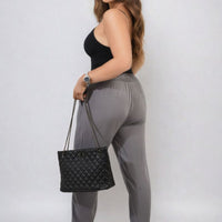 Grey high-waist drawstring trousers with side pockets, loose drape and wide legs.