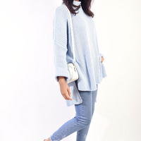 Oversized Jumper in Orange with High Neck and Side Splits