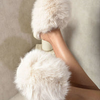 Cream faux-fur winter slide sandal with plush strap and open toe