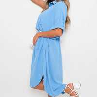 Sky blue button-down collared midi dress with two front pockets and side slit