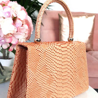 Faux Leather Handbag in Lilac with Top Handle and Chain Strap