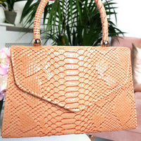 Faux Leather Handbag in Lilac with Top Handle and Chain Strap