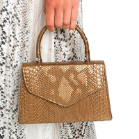Faux Leather Handbag in Lilac with Top Handle and Chain Strap