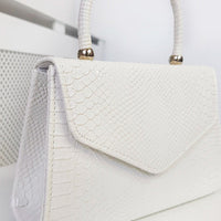 Faux Leather Handbag in Lilac with Top Handle and Chain Strap