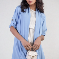 Light blue open-front cardigan with rolled sleeves and button cuff detail