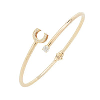 Gold bangle bracelet with pavé C initial and crystal accents