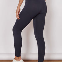 Navy seamless high-waist leggings with full-length legs and smooth waistband.