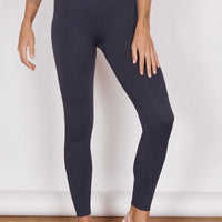High-waist navy seamless leggings, full-length stretch fit with smooth finish.