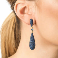 Latelita sapphire blue CZ long drop earrings worn on ear