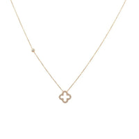 Delicate gold-tone open clover pendant necklace with minimal clover charm