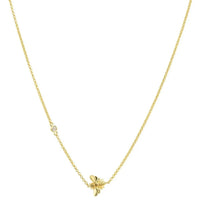 Gold-tone chain necklace with centered winged bee pendant