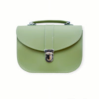 Sage green leather crossbody bag with flap and silver buckle clasp