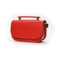 Red leather flap crossbody bag with short handles and side strap