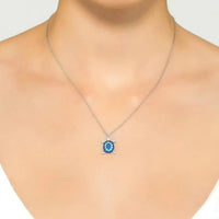 Silver pendant necklace with small round blue turtle charm on chain