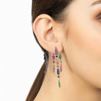 Rainbow crystal drop earrings in rose gold, shown on ear
