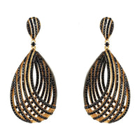 Black CZ teardrop chandelier earrings with gold-toned outlines, oval hoop drop