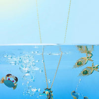 Turquoise seahorse charms with gold-tone chain links
