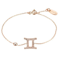 Gemini zodiac star sign bracelet with rose gold-tone chain and CZ “II” charm