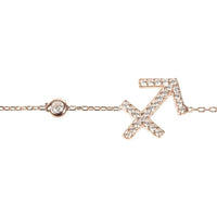 Rose gold Sagittarius bracelet detail: arrow star sign charm with crystal-studded links
