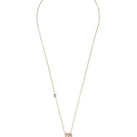 Rose gold chain necklace with small Scorpio M pendant at center