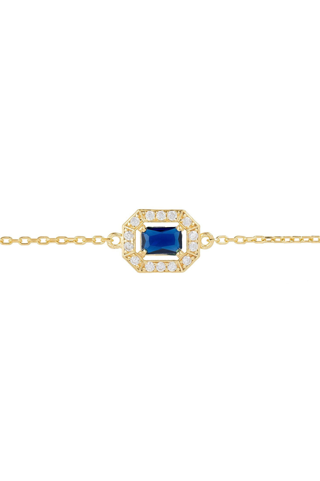 Gold gemstone bracelet with blue sapphire square setting and halo detail