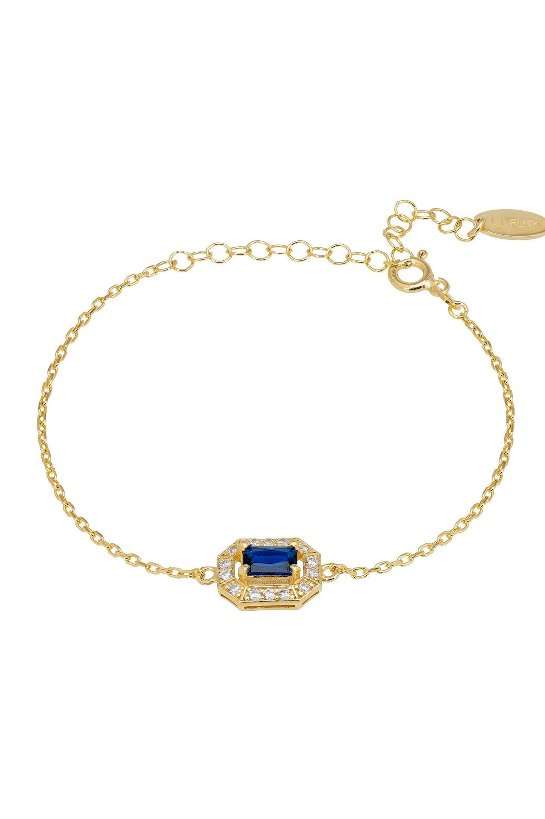 Gold gemstone bracelet with blue sapphire centerpiece and linked chain