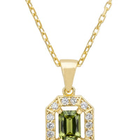 Gold gemstone pendant necklace with green cushion-cut center and crystal halo