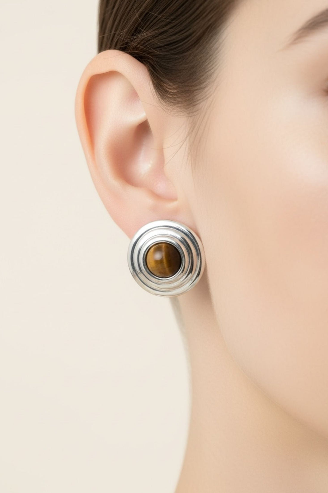 Silver stud earrings with stacked circles and brown tiger&